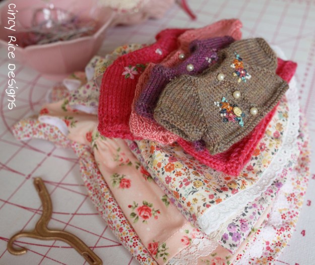 4 dresses and 4 sweaters 589